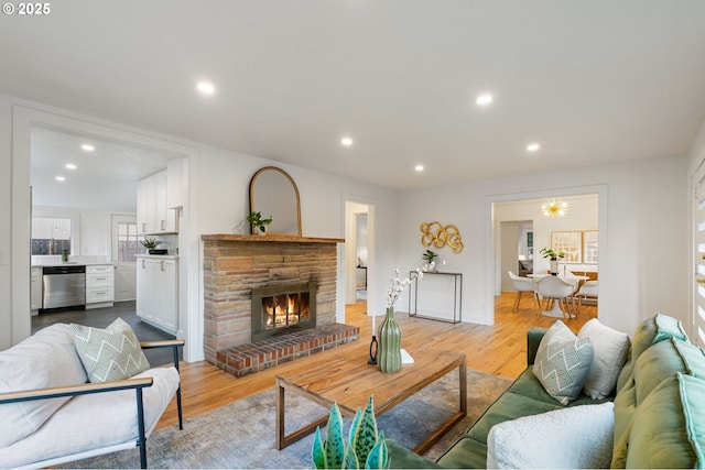 7170 SW 76th Ave, Portland, OR 97223 - living area with recessed lighting, light wood-style flooring, and a glass covered fireplace