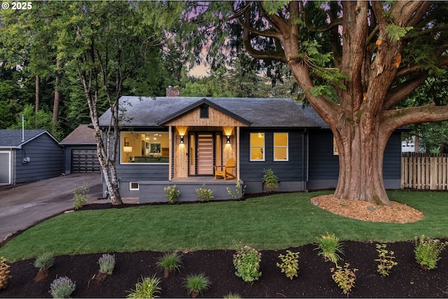 7170 SW 76th Ave, Portland, OR 97223 - single story home featuring a chimney, a detached garage, an outdoor structure, and roof with shingles