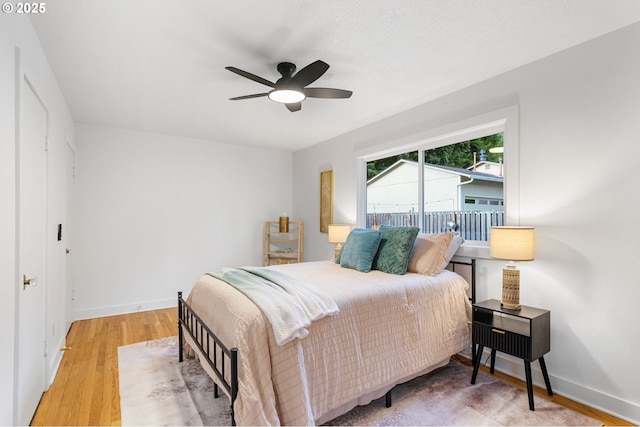 7170 SW 76th Ave, Portland, OR 97223 - bedroom featuring wood finished floors and ceiling fan