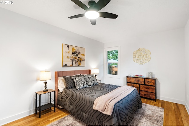 7170 SW 76th Ave, Portland, OR 97223 - bedroom with wood finished floors and ceiling fan