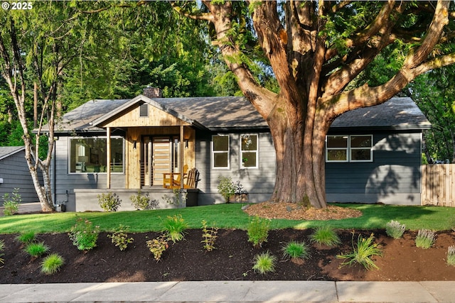 7170 SW 76th Ave, Portland, OR 97223 - view of front of property with a chimney and roof with shingles