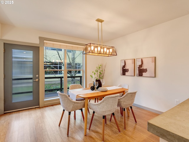 dining space featuring hardwood / wood-style flooring