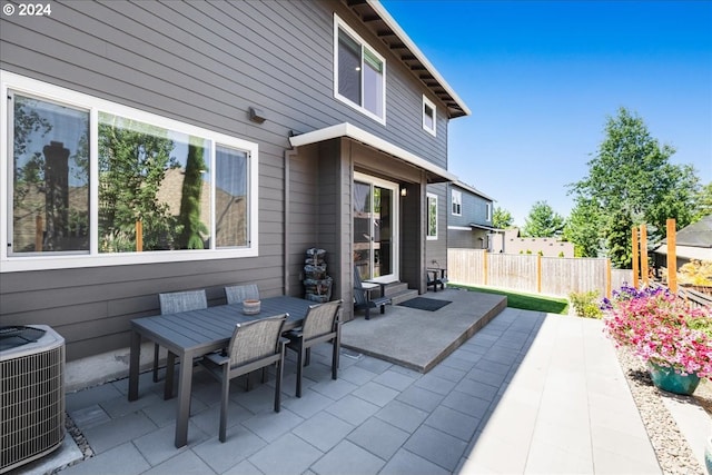 view of patio featuring cooling unit