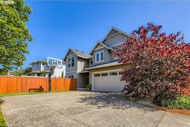 8326 SW Oak St, Portland, OR 97223 - view of property exterior featuring a garage and concrete driveway
