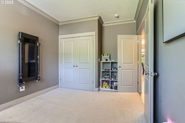 8326 SW Oak St, Portland, OR 97223 - carpeted bedroom featuring crown molding, a closet, and a textured ceiling