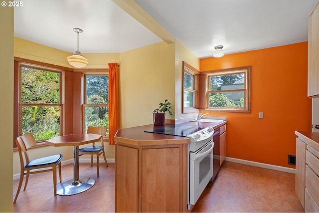 3116 SE 74th Ave, Portland, OR 97206 - kitchen with white electric range oven and pendant lighting