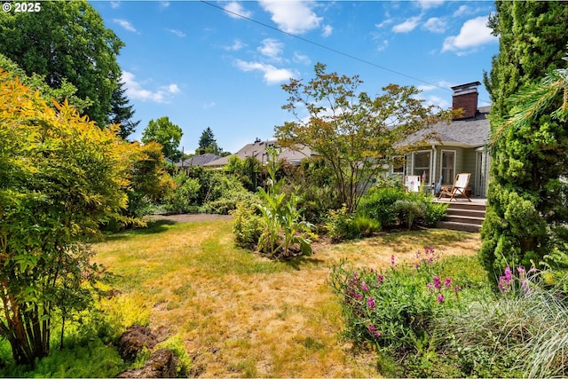 3116 SE 74th Ave, Portland, OR 97206 - view of green lawn with a deck
