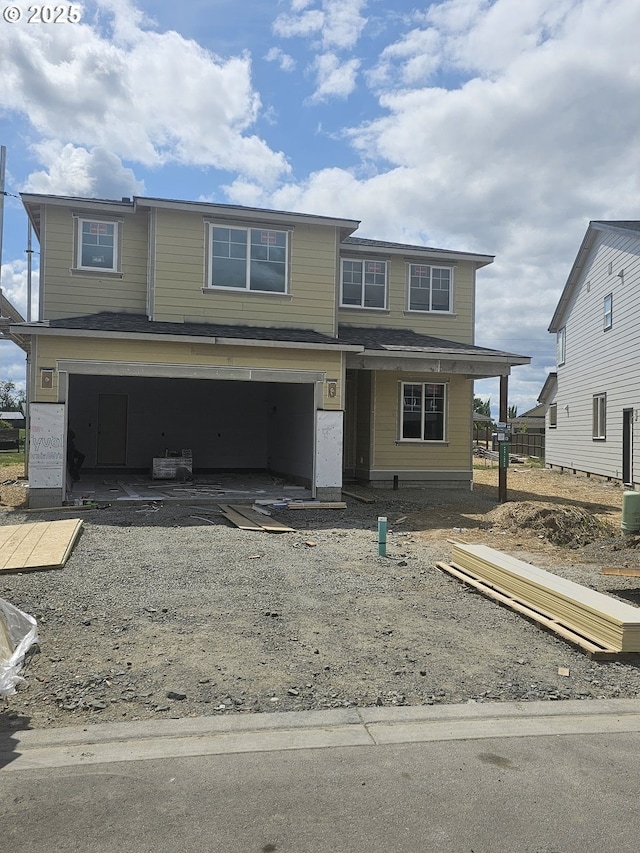 3839 S Arwana Ln, Ridgefield, WA 98642 - view of front of home with an attached garage, cooling unit, and driveway