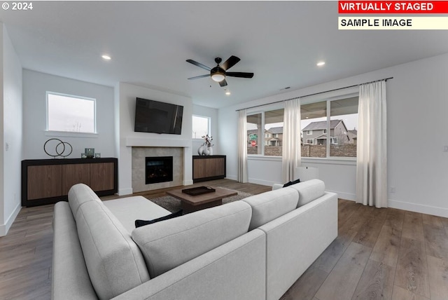 3839 S Arwana Ln, Ridgefield, WA 98642 - living room with baseboards, a ceiling fan, recessed lighting, and wood finished floors
