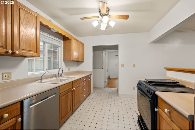 kitchen featuring electric range, a sink, light countertops, light floors, and dishwasher