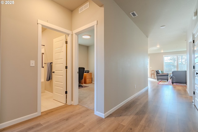 hallway featuring light hardwood / wood-style floors