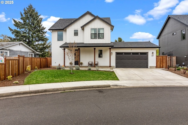 507 Honeysuckle Ln, Eugene, OR 97401 - modern farmhouse style home with covered porch, a garage, driveway, and board and batten siding