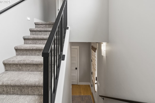507 Honeysuckle Ln, Eugene, OR 97401 - stairs with wood finished floors and baseboards
