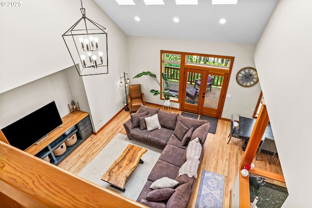 770 N Moss St, Lowell, OR 97452 - living area with a skylight, recessed lighting, wood finished floors, french doors, and vaulted ceiling