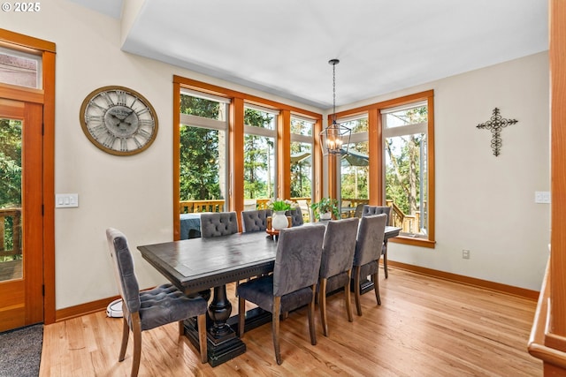 770 N Moss St, Lowell, OR 97452 - dining space featuring a chandelier and light wood finished floors