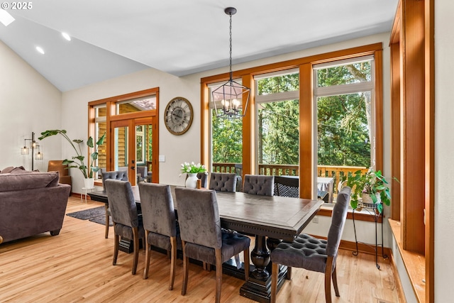 770 N Moss St, Lowell, OR 97452 - dining area with light wood-type flooring, a chandelier, and vaulted ceiling