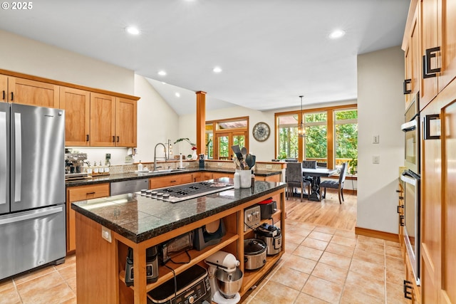 770 N Moss St, Lowell, OR 97452 - kitchen featuring appliances with stainless steel finishes, tile counters, open shelves, recessed lighting, and vaulted ceiling