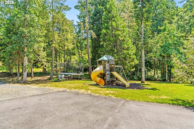 770 N Moss St, Lowell, OR 97452 - communal playground featuring a trampoline and a lawn