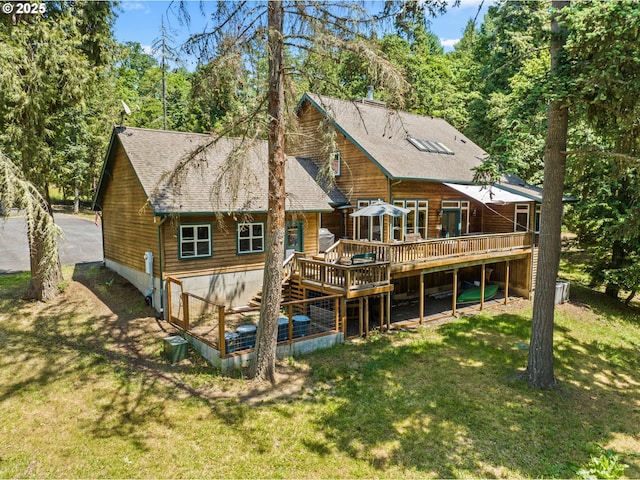 770 N Moss St, Lowell, OR 97452 - rear view of property with a wooden deck, a lawn, roof with shingles, and stairway