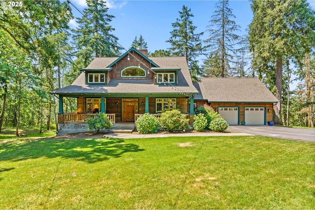770 N Moss St, Lowell, OR 97452 - view of front facade featuring asphalt driveway, a garage, a porch, a chimney, and a front lawn