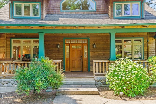 770 N Moss St, Lowell, OR 97452 - doorway to property featuring covered porch and a shingled roof