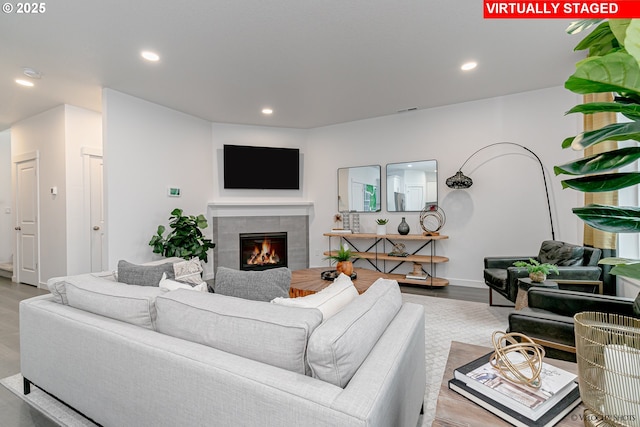 2747 Woodfern Ter Lot 57, Eugene, OR 97403 - living area with a tile fireplace, recessed lighting, and wood finished floors
