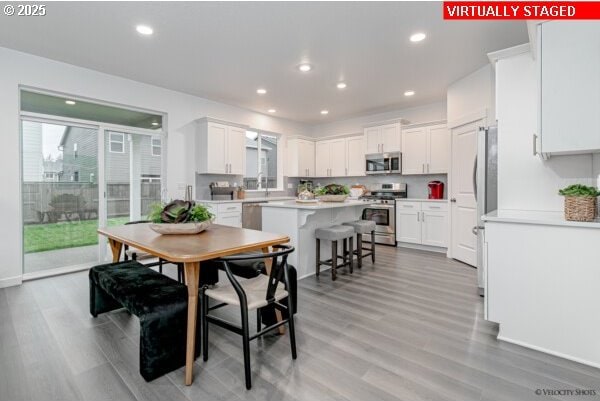 2747 Woodfern Ter Lot 57, Eugene, OR 97403 - dining area featuring light wood-type flooring and recessed lighting