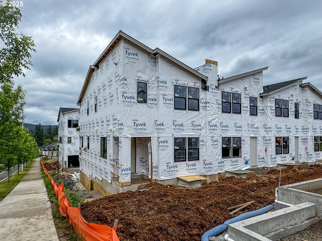 6496 NW Olympic Ln Unit L 25, Camas, WA 98607 - unfinished property featuring a chimney