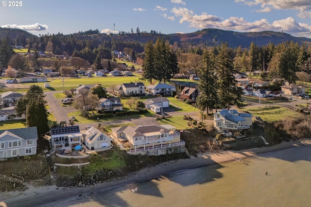 birds eye view of property with a residential view and a mountain view