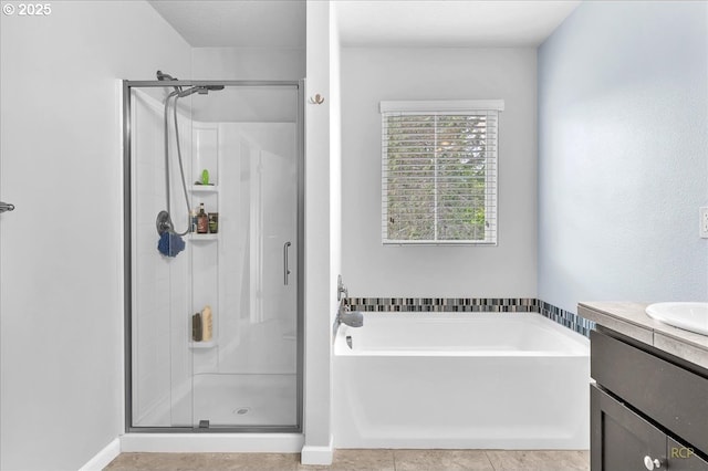 51568 SW S Fork Loop, Scappoose, OR 97056 - bathroom featuring a stall shower, a garden tub, and vanity