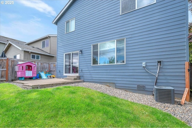 51568 SW S Fork Loop, Scappoose, OR 97056 - back of house with a patio area, central air condition unit, and entry steps