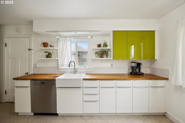 kitchen featuring open shelves, butcher block countertops, dishwasher, and tasteful backsplash