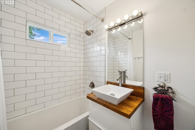 bathroom with shower / tub combo with curtain and vanity