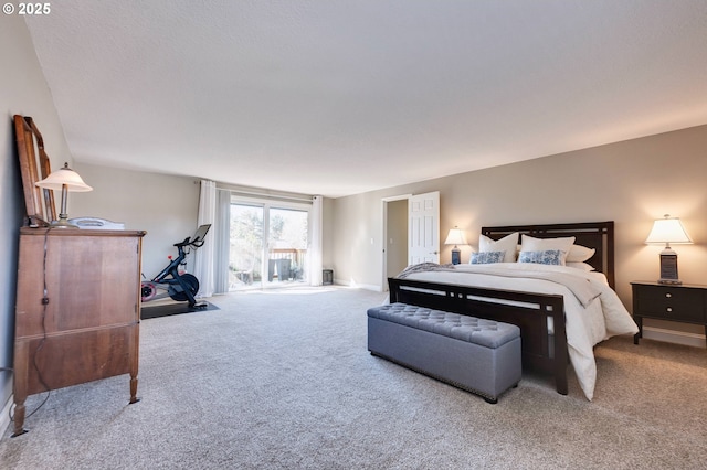 carpeted bedroom with access to outside