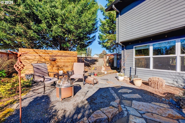 view of patio / terrace with a fire pit