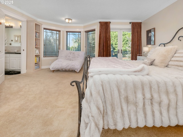 bedroom with connected bathroom, light colored carpet, multiple windows, and crown molding