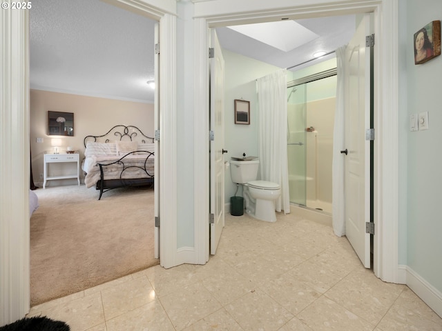 hall with a textured ceiling, crown molding, and light carpet