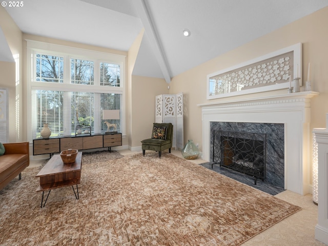 living room featuring beam ceiling, a premium fireplace, and high vaulted ceiling