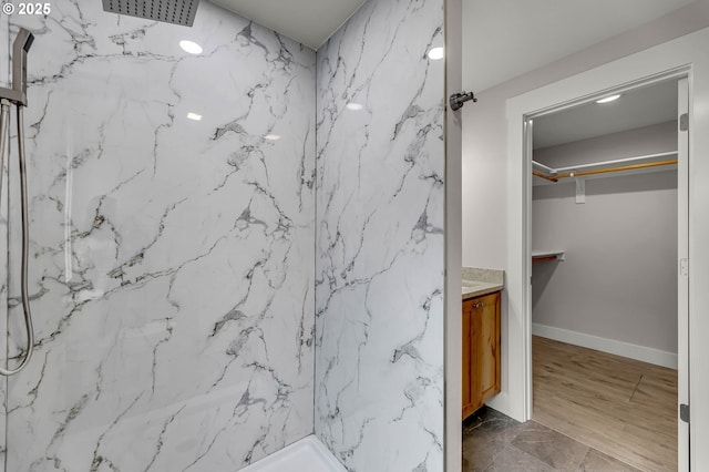 1633 N Q St, Washougal, WA 98671 - full bath with a marble finish shower, a walk in closet, and vanity