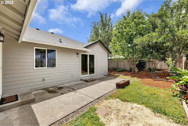 1633 N Q St, Washougal, WA 98671 - rear view of house with roof with shingles and a patio area