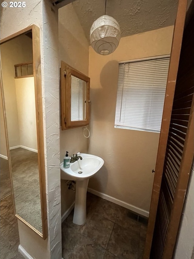 bathroom featuring tile patterned flooring