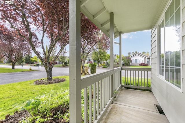 516 SE 8th Pl Unit H17, Battle Ground, WA 98604 - exterior space with a yard, covered porch, and a residential view