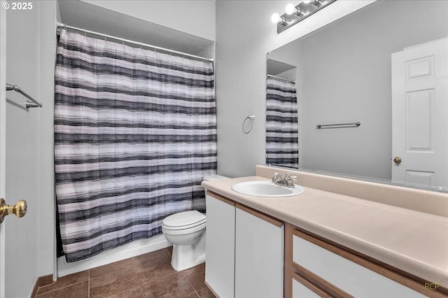 full bath with tile patterned flooring, toilet, curtained shower, and vanity