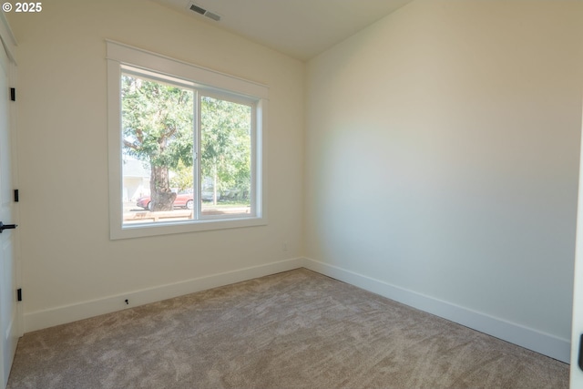 535 E St, Independence, OR 97351 - carpeted empty room featuring baseboards