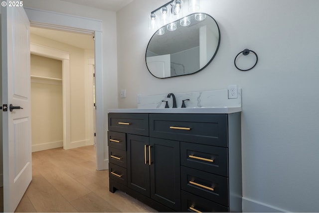 535 E St, Independence, OR 97351 - bathroom featuring vanity and wood finished floors