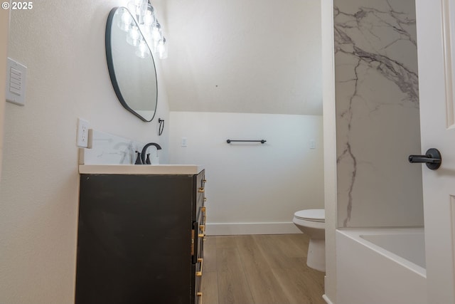 535 E St, Independence, OR 97351 - bathroom with vanity, wood finished floors, and lofted ceiling