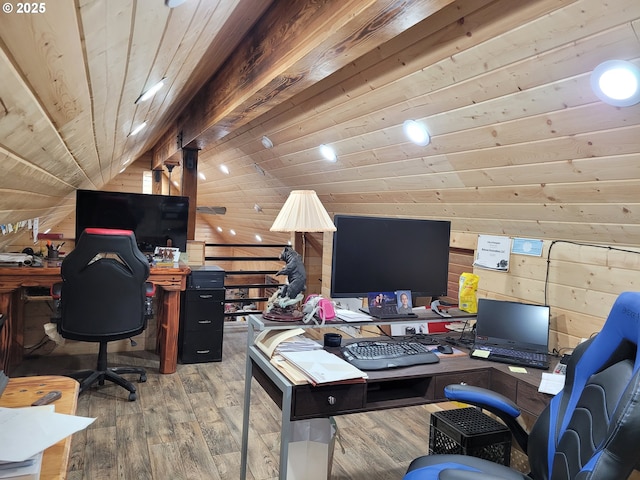 office with wood walls, wood ceiling, wood finished floors, and vaulted ceiling