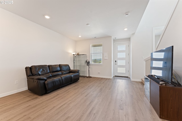 8229 SE Kinnaman St, Hillsboro, OR 97123 - living room featuring light wood-type flooring, baseboards, and recessed lighting