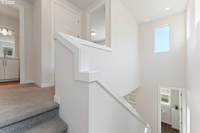 8229 SE Kinnaman St, Hillsboro, OR 97123 - staircase with plenty of natural light, carpet flooring, baseboards, and recessed lighting