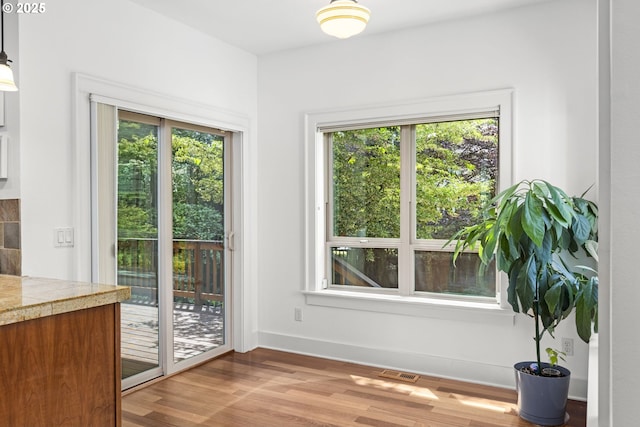 3946 SW Coronado St, Portland, OR 97219 - entryway with plenty of natural light and wood finished floors